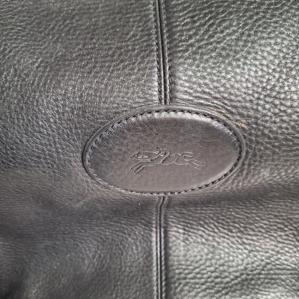 Longchamp Pebbled Black leather Bag.